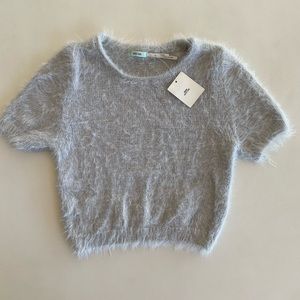 Urban outfitters fuzzy top! Can fit sizes XS-S